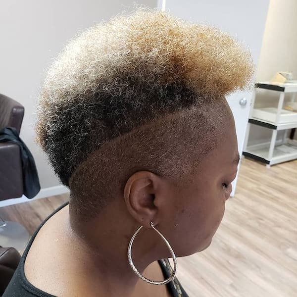 Faded Blonde Haircut with Shaved Sides
