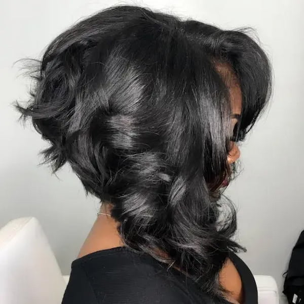 Angled Black Cut with Soft Curls