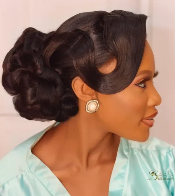 Curly Chignon with Side Swept Bangs