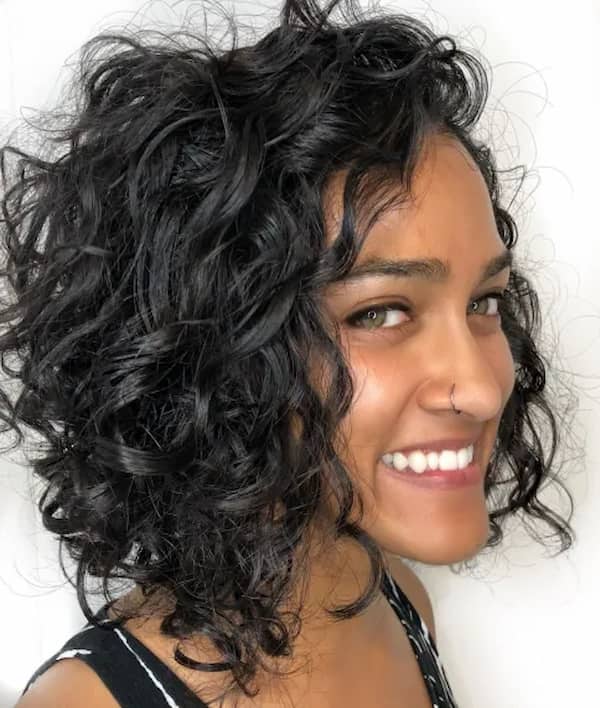 Sexy Platinum Mod Bob with Allover Messy Curly Texture and Long Side Swept  Curly Bangs  The Latest Hairstyles for Men and Women 2020   Hairstyleology