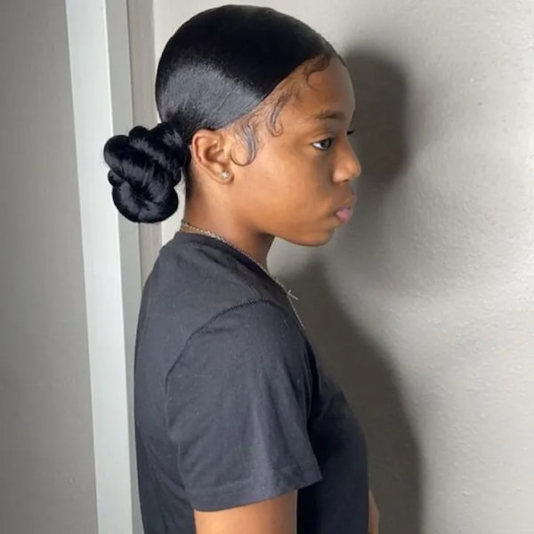 How to Achieve a SlickedBack Bun on Natural Hair According to Hairstylists