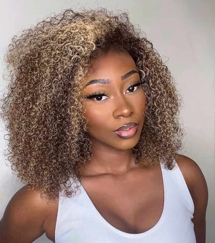Brown Kinky Curls with Blonde Highlights
