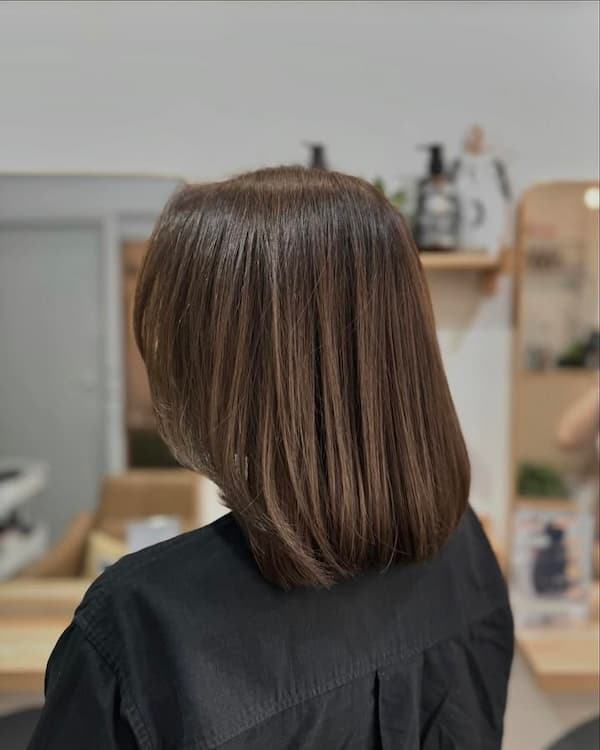 Deep Side Part with Straight Hair