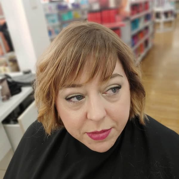 Side-Swept Bangs with Medium Layers