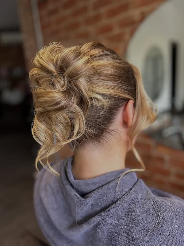 Loose Bun with Face-Framing Pieces