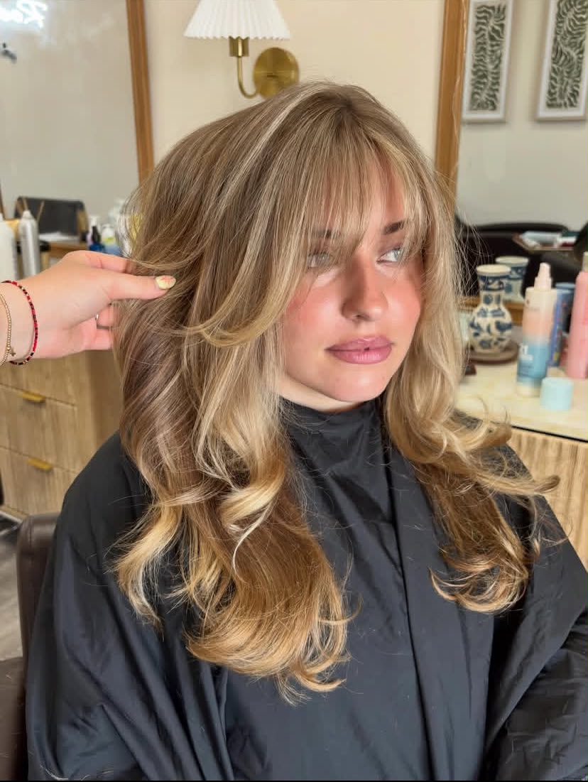 Long and Textured With Curtains Bangs